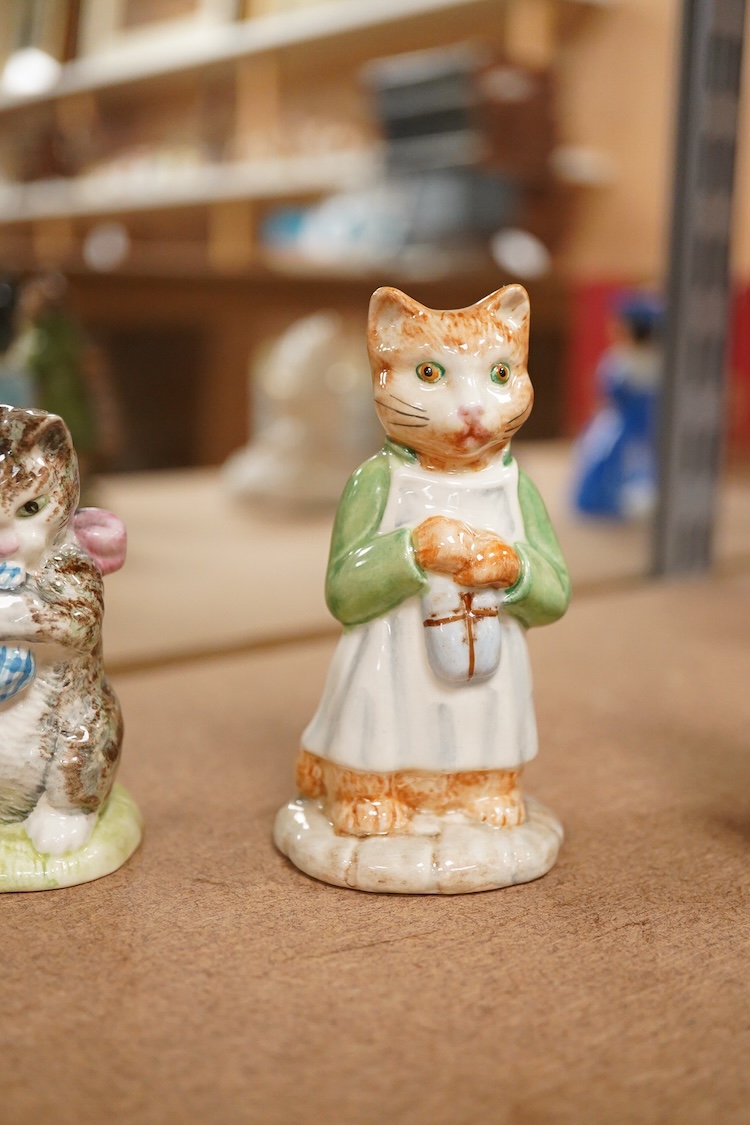 Four Beatrix Potter Beswick figures; Simpkin, Ginger, Miss Moppet and Pig-Wig, largest 10cm high